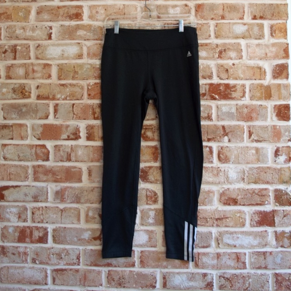Adidas women's black golf leggings with three stripe detail, size M